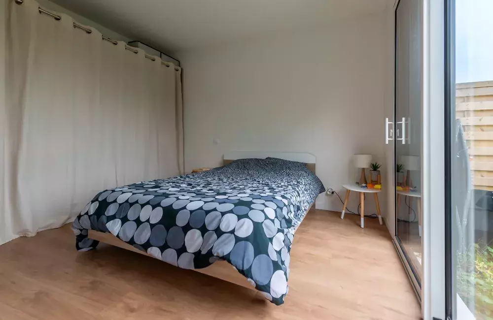 chambre avec grande ouverture maison initiale bois chaumes en retz